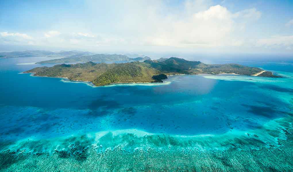 Isla rodeada de arrecifes en Fiji COMO Laucala Island hotel lujo